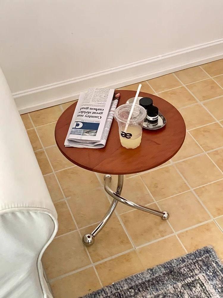 Rund sidobord i massivt trä med rostfritt stål