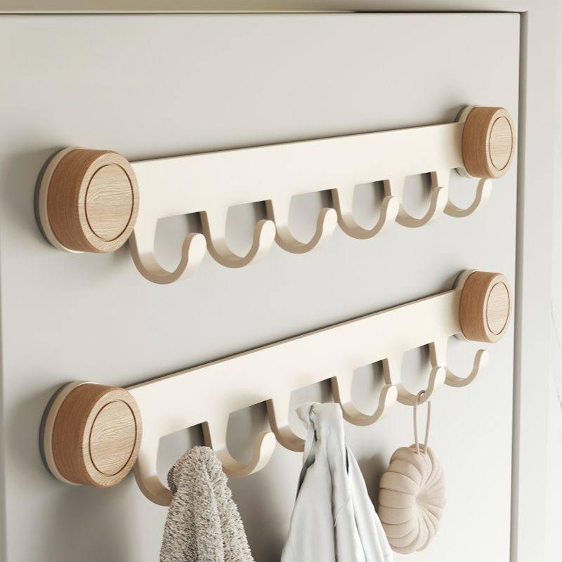 Väggkrok i valnötsträ – nagelfri installation