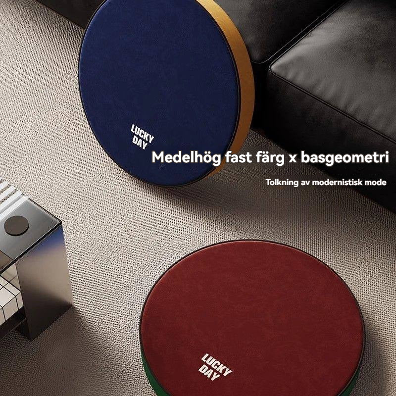 Rund sittdyna i Bauhaus-estetik